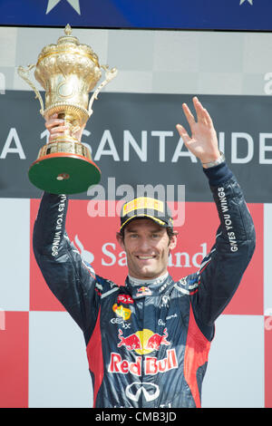 08.07.2012 Towcester, England. Australischen Formel1-Fahrer Mark Webber von Red Bull feiert seinen Sieg auf dem Podium, nachdem der Grand Prix von Großbritannien in Silverstone-Rennen verfolgen in Northamptonshire, Großbritannien, 8. Juli 2012. Stockfoto