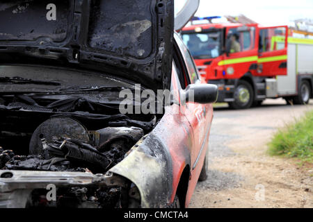 British Fire and Rescue Appliance - Fire Engines - von Norfolk Fire & Rescue Service Besuchen Sie einen Notruf für ein Fahrzeug Feuer, ein Auto in Brand. Stockfoto