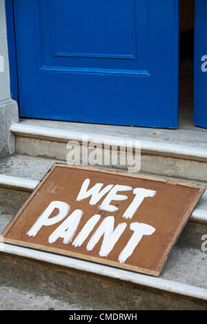 Weymouth, Großbritannien Mittwoch, 25. Juli 2012. nasse Farbe Zeichen auf Treppe Stockfoto