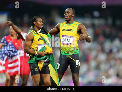 YOHAN BLAKE & USAIN BOLT Jamaika LONDON 2012 Olympische Spiele, MENS 4X100M FINALL STRATFORD, LONDON, ENGLAND 11. August 2012 DIC9321 Stockfoto