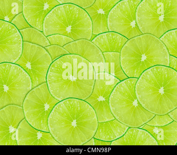 Abstrakten grünen Hintergrund mit Zitrus-Früchten von Limetten. Close-up. Studio-Fotografie. Stockfoto