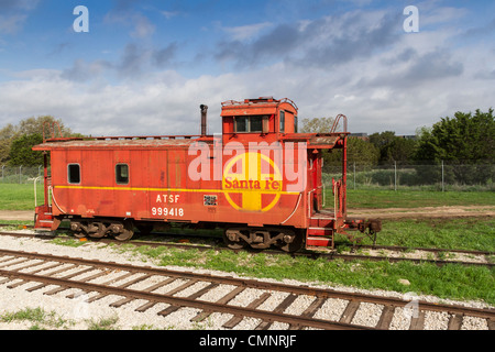 Vintage Caboose Eisenbahnwagen in Austin und Texas Central Railroad Depot in Austin, Texas. Stockfoto