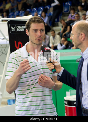 Marat Safin (l.) gibt Interviews nach der 3. Platz match gegen Mark Philippoussis bei BNP Paribas Open verlor Stockfoto