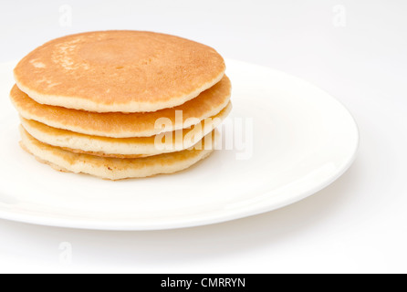 Vier Pfannkuchen auf einem weißen Teller Stockfoto
