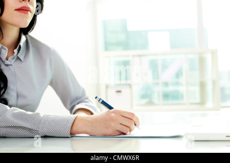 Geschäftsfrau, die Notizen am seminar Stockfoto