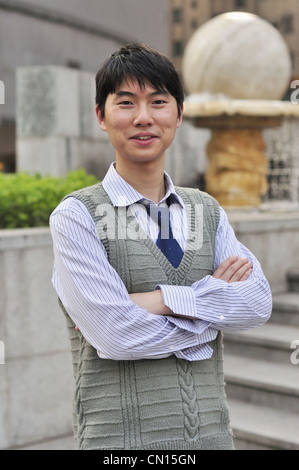 zuversichtlich asiatischen Geschäftsmann Stockfoto