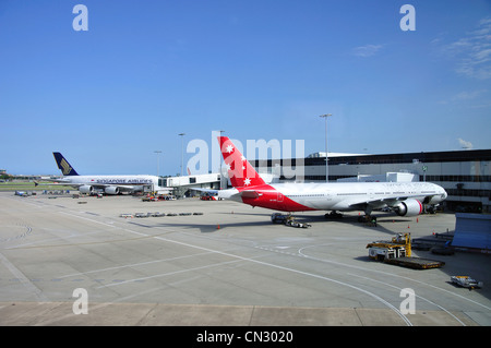 Virgin Australia Boeing 777-3ZG Flugzeuge am Flughafen Sydney (Kingsford Smith), Maskottchen, Sydney, New South Wales, Australien Stockfoto