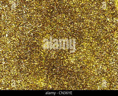 Goldglitter Makro Nahaufnahme Textur Hintergrund. Stockfoto