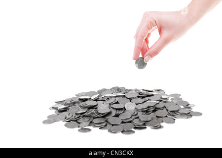 Eine polnische Zloty Münzen in Menschenhand. Einsparungen und Business Konzept isoliert auf weißem Hintergrund. Stockfoto