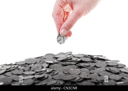 Eine polnische Zloty Münzen in Menschenhand. Einsparungen und Business Konzept isoliert auf weißem Hintergrund. Stockfoto