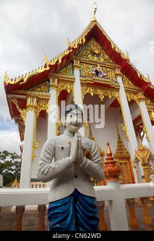 Eine Figur begrüßen Menschen zu einem Tempel Wat Chalong, Phuket, Thailand Stockfoto