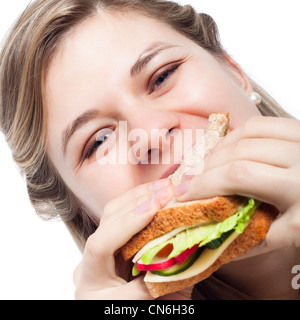 Nahaufnahme von schönen jungen glücklich Frau Sandwich zu essen. Stockfoto