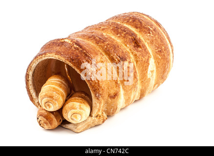 Drei leere typisch italienische Cannoli Gebäck und ein großer auf weißem Hintergrund Stockfoto