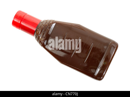Barbecue-Sauce mit roten Mütze Stockfoto