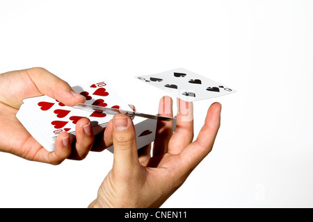 Drei Karten in der Hand, isoliert auf weiss Stockfoto