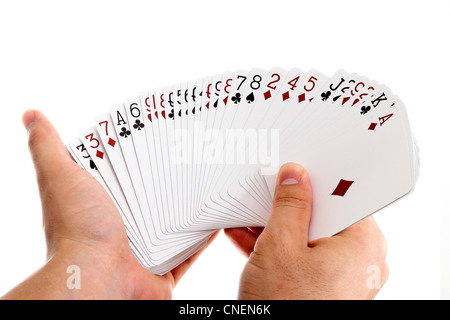 Spielkarten in der hand mit Ventilator verteilt Stockfoto