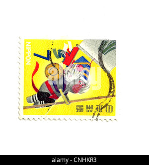 JAPAN - CIRCA 1968: Briefmarke gedruckt durch Japan, zeigt eine Nippon Affe mit einem gelben Hintergrund, Teil des japanischen Postgeschichte. Stockfoto