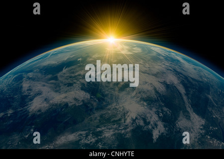 Sonnenaufgang über dem Planetenerde Stockfoto Sonnenaufgang über dem Planetenerde Stockfoto