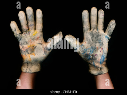 Zwei Hände mit schmutzigen weißen Handschuhen, statt sich um zu ergeben, symbolische Foto Stockfoto