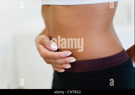 Frau mit Bauch, Mittelteil Stockfoto