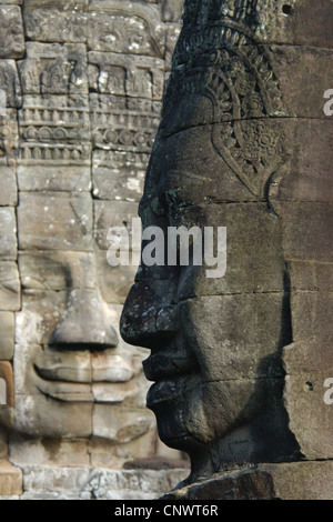 Stein-Gesichter der Bodhisattva Lokesvara in der Bayon-Tempel in Angkor, Kambodscha. Stockfoto