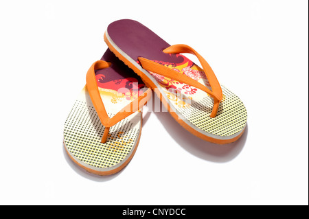 Ein paar Orange und rot flip flops Stockfoto