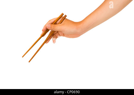 isoliert Man Hand mit hölzernen Stäbchen mit Beschneidungspfad in Jpg. Stockfoto