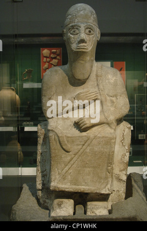 Stein-Statue von König Idrimi von Alalah in seinem Thron sitzt. 1570-1500 V.CHR. British Museum. London. Vereinigtes Königreich. Stockfoto