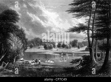 Malerische Aussicht auf Scone Palace mit Menschen schwimmen im Vordergrund See, Perthshire, Schottland. Stockfoto