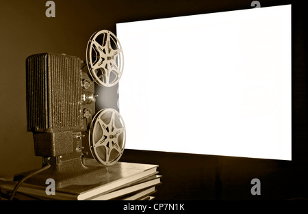 Ein Filmprojektor Jahrgang Reel-to-Reel Film gedreht in häuslicher Umgebung. Stockfoto