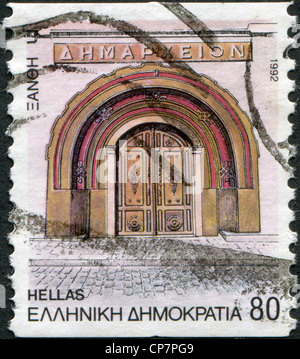 Griechenland - ca. 1992: Briefmarken gedruckt in Griechenland, zeigt Xanthe, Tür des Rathauses, ca. 1992 Stockfoto