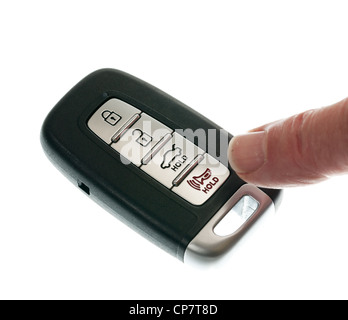 Finger drücken der Alarm auf schwarz modernes Auto Türöffner und keyless-Entry-Gerät Stockfoto