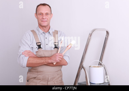 Maler mit Pinsel in der hand Stockfoto