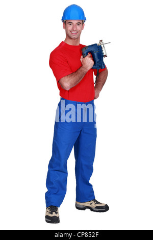 Tischler mit Bandsäge Stockfoto