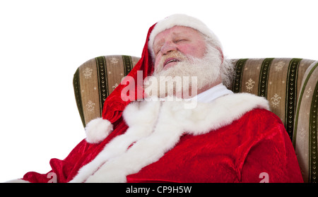 Santa Claus in authentischen Look schlafen im Retro-Ohrensessel. Alle auf weißem Hintergrund. Stockfoto