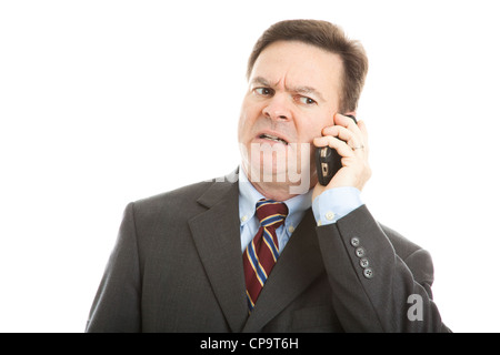 Unternehmer auf sein Handy zu sprechen. Sehr ausdrucksstarke Gesicht besorgt. Isoliert auf weiss. Stockfoto