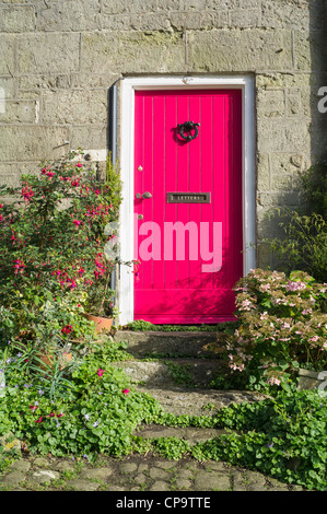 Rosa Hütte Tür bei Gold Hill Shaftesbury Dorset UK Stockfoto