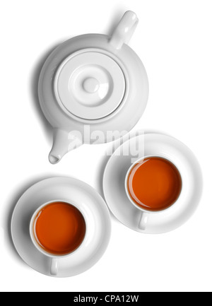 Tasse Tee mit Teekanne isoliert auf weiss. Stockfoto
