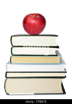 Bücher-Turm mit Apple isoliert auf weiss Stockfoto