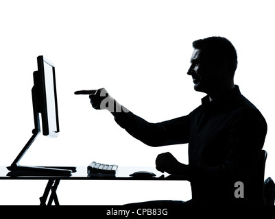 eine kaukasische Geschäftsmann zeigt Geste Computer computing Silhouette Studio isoliert auf weißem Hintergrund Stockfoto