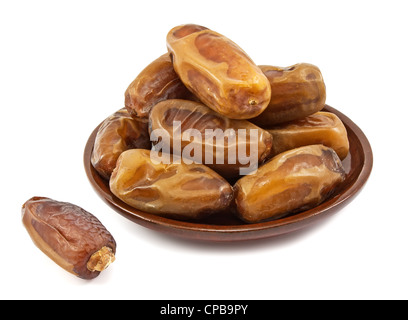 Datum Früchte in einer Platte auf weißem Hintergrund Stockfoto