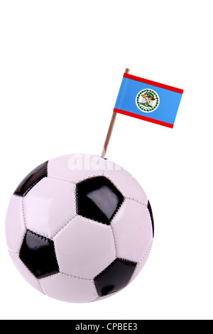 Soccerball oder Fußball verziert mit einer kleinen Nationalflagge auf einem toothstick Stockfoto