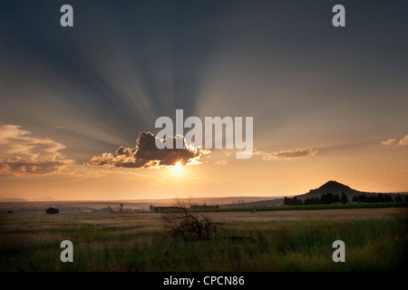 Sonne durch die Wolken Stockfoto