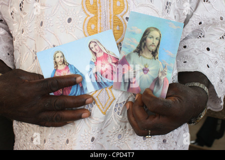 Religiöse Bilder von Christus und Maria, Lome, Togo, West Afrika, Afrika Stockfoto