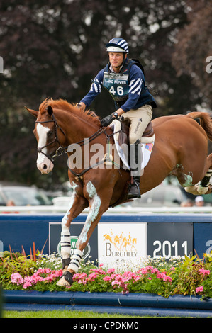 Boyd Martin und Neville Bardos - Cross Country Tag bei Land Rover Burghley Horse Trials 2011. 09.01.2011. Stamford England Stockfoto