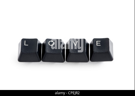 Computer-Tasten isoliert auf weiss Rechtschreibung das Wort Liebe Stockfoto