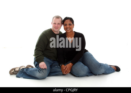 Junge paar Rennen auf einem weißen Hintergrund gemischt Stockfoto