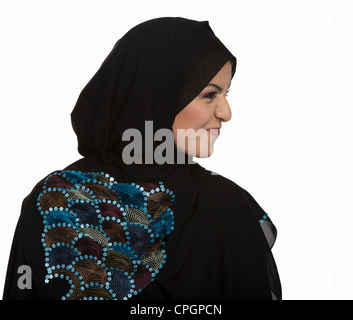 Junge Frau spotten, seitliche Ansicht Stockfoto