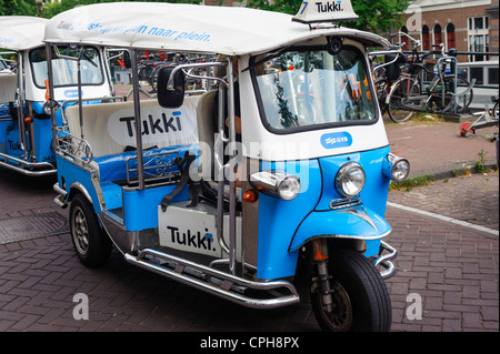 Drei Räder Taxi auf den Straßen von Amsterdam, Niederlande Stockfoto