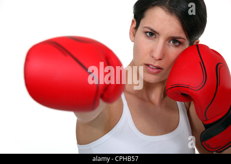 Frau mit Boxhandschuhen Stockfoto